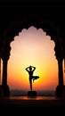 Yoga silhouette in old temple at sunset sky background. Royalty Free Stock Photo