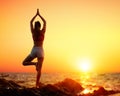 Girl In Vrikshasana Pose- Yoga At Sunset