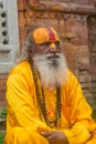 Yoga teacher with beard at the temple in Kathmandu in Nepal Royalty Free Stock Photo