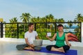 Yoga teacher and the woman