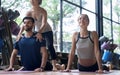 Yoga teachers are practicing teaching correct yoga practice to students.