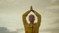 Yoga trainer meditating in tree pose. Sports woman exercising yoga in mountains Royalty Free Stock Photo