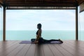 Yoga Training. Woman In Sport Clothes Stretching Body Near Sea Royalty Free Stock Photo