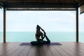 Yoga Training. Woman In Sport Clothes Stretching Body Near Sea Royalty Free Stock Photo