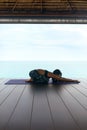 Yoga Training. Woman In Sport Clothes Stretching Body Near Sea Royalty Free Stock Photo