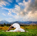 Yoga valakhilyasana pose Royalty Free Stock Photo