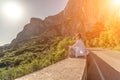 Yoga woman mountains. Profile of a woman doing yoga in the top of a cliff in the mountain. Woman meditates in yoga asana Royalty Free Stock Photo