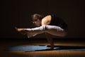 Yoga woman practising her strength and balance