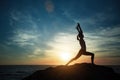 Yoga woman silhouette on the sea beach at amazing sunset. Royalty Free Stock Photo