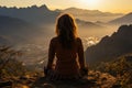 Yoga woman sitting on top of a mountain at sunrise. Mountains in the fog. Meditation. Generative Ai Royalty Free Stock Photo