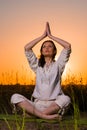 Yoga woman during sunset