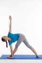 Yoga - young beautiful woman doing excerise Royalty Free Stock Photo