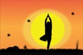Yoga by Young Man at sunrise or sunset