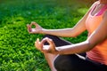 Yoga. Young woman practicing yoga or dancing or stretching in nature at park. Health lifestyle concept