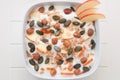 Yoghurt with apple and pumpkin seeds Royalty Free Stock Photo