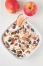 Yoghurt with apple and pumpkin seeds Royalty Free Stock Photo