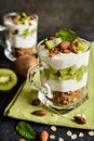 Yoghurt with baked muesli, kiwi and almond