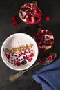 Yoghurt with cereals and fresh forest fruits and sliced pomegranate. Royalty Free Stock Photo