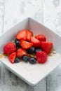 Yoghurt with cereals and fresh fruits Royalty Free Stock Photo