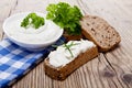 Yoghurt creamy cheese with herbs and bread