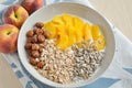 Yoghurt with granola and peach Royalty Free Stock Photo