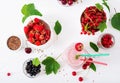 Yoghurt-strawberry smoothies in a jar