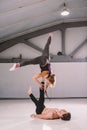 Yogi couple practice. Couple young sporty peoplepracticing acrobatic yoga lesson with partner, man and woman in yogi exercise, arm