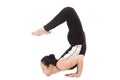 Yogi female in yoga Scorpion Pose Vrischikasana Royalty Free Stock Photo