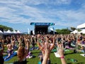 Yogi move arms in Farewell: blissed and blessed yoga class Royalty Free Stock Photo