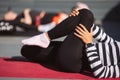 Yogi woman and diverse group of sporty people practicing yoga Royalty Free Stock Photo