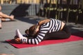 Yogi woman and diverse group of sporty people practicing yoga Royalty Free Stock Photo