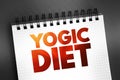 Yogic diet text on notepad, concept background