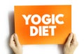 Yogic diet text quote on card, concept background