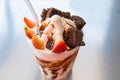 Yogur with chocolate cream strawberries and chocolate cake Royalty Free Stock Photo