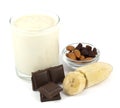 Yogurt with banana, chocolate, almonds and raisins