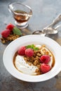 Yogurt bowl with raspberry and maple syrup Royalty Free Stock Photo