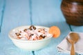 Yogurt with carrots and walnuts. rustic.