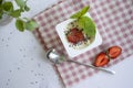 Yogurt chia seeds, strawberries,  fresh  sweet  delicious mint on a light background Royalty Free Stock Photo