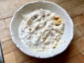 Yogurt with Corn Bread Pieces in Bowl / Traditional Cornbread Yoghurt