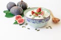 Yogurt with fig fruit slices. Royalty Free Stock Photo