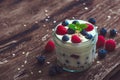 Yogurt with Fresh Berries on Woden Table Royalty Free Stock Photo