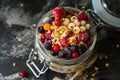 Yogurt with granola and berries in small jar, strawberries, blueberries., black currant. sweetness. Homemade yogurt Royalty Free Stock Photo