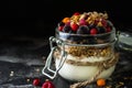 Yogurt with granola and berries in small jar, strawberries, blueberries., black currant. sweetness. Homemade yogurt. Healthy food