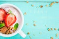 Yogurt with granola, nuts and fresh strawberry Royalty Free Stock Photo