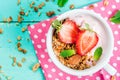 Yogurt with granola, nuts and fresh strawberry Royalty Free Stock Photo