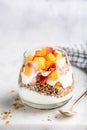 Yogurt granola parfait with peaches