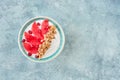 Yogurt with granola and red grapefruit, pomegranate for healthy breakfast. Bowl of greek yogurt with granola , honey and fresh Royalty Free Stock Photo