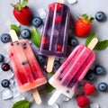 Yogurt ice cream popsicles with ice, berries and mint, top view, flat lay. Summer dessert, frozen fruit juice. Colorful berry Royalty Free Stock Photo