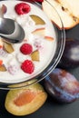 Yogurt mixed with fruit pieces Royalty Free Stock Photo