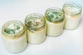 Yogurt with mold in glass container in laboratory